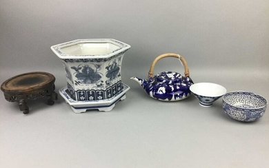 A CHINESE BLUE AND WHITE PLANTER AND STAND, ALONG WITH A TEAPOT AND TWO BOWLS