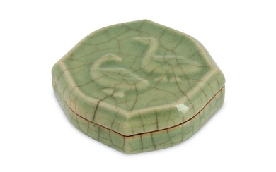 A CHINESE CELADON-GLAZED 'DUCK' COSMETIC BOX AND COVER 青釉印模雙鴨紋菱形蓋盒