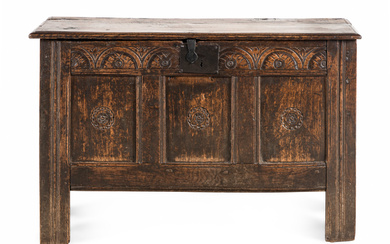 A Charles II Carved Oak Plank Chest