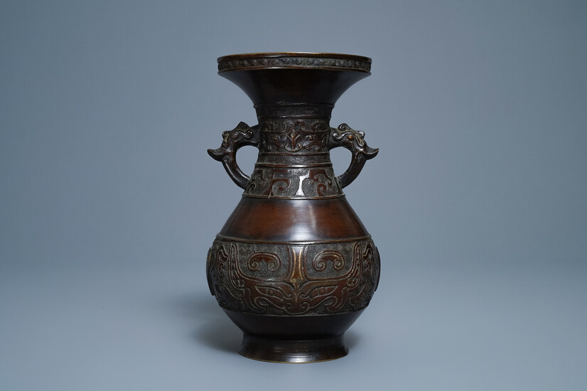 A Chinese archaic parcel-gilt bronze vase, Xuande mark, 18th C.