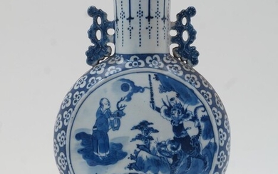 A Chinese blue and white porcelain moon flask, 19th century, with twin foliate pierced handles to the neck, the disc-shaped body decorated with a narrative scene surrounded by a border of peonies, 31cm high
