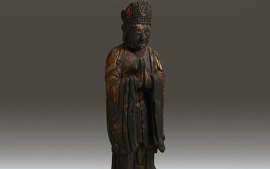 A Chinese carved and gilt-laquered figure of Guanyin