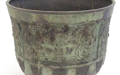 A Chinese cast jardiniere / planter with banded