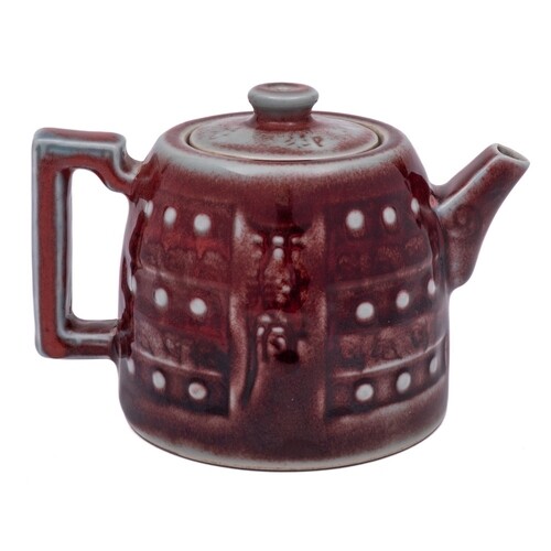 A Chinese copper red glazed teapot and cover: of circular sq...