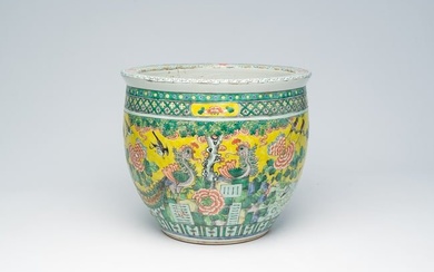 A Chinese famille verte jardiniere with birds among blossoming branches, 19th C.