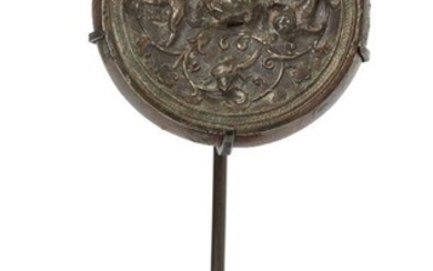 A Chinese miniature silver sheet-inlaid bronze circular mirror, Tang dynasty,...