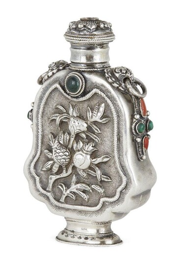 A Chinese silver hardstone set snuff bottle, late 19th century, finely decorated to the body with pomegranates and with Buddhist lion mask and ring handles, unmarked, 7.5cm high