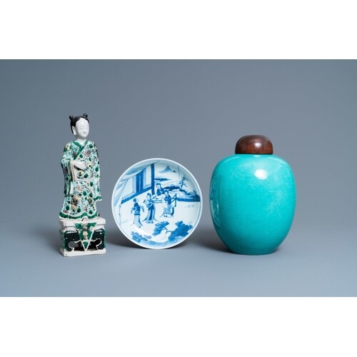 A Chinese verte biscuit figure, a green 'lotus' jar and a fi...