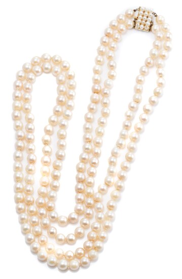 A DOUBLE STRAND CULTURED PEARL NECKLACE; 7-7.4mm near round pearls of good colour and lustre to 14ct gold box clasp with safety catc...