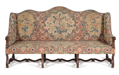A French walnut and needlework upholstered settee, 18th century and later elements