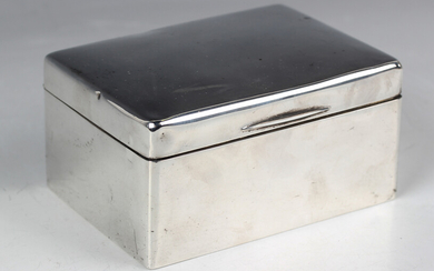A George V silver rectangular cigarette box with hinged lid, London 1918 by Frederick William Hentsc
