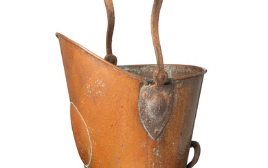 A Gustav Stickley hammered copper coal scuttle