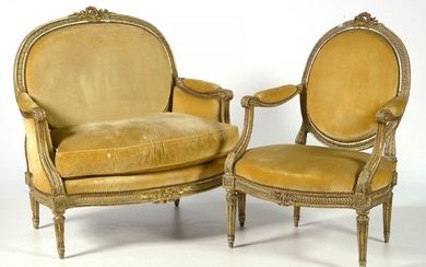 A Louis XVI style armchair and marquise in carved wood with a grey and gold patina with a medallion back and trimmed in pale yellow velvet. Stamped I.B. Lelarge for Jean-Baptiste Lelarge (II or III). French work. Period: 18th century.