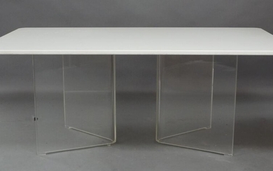 A Lucite dining table, 1970's, the white painted top raised on twin curved Perspex supports, 73cm high, 183cm wide, 107cm deep