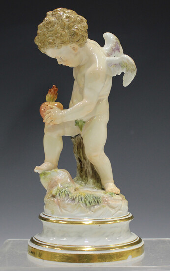 A Meissen figure of Cupid, late 19th century, modelled after Schwabe as Cupid piercing a flaming hea