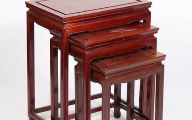 A NEST OF THREE CHINESE HARDWOOD OCCASIONAL TABLES.