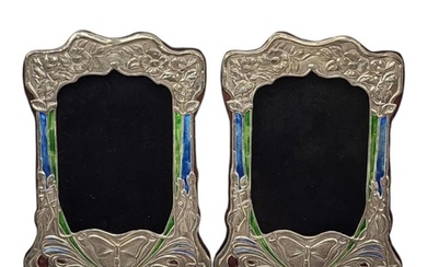 A PAIR OF ART NOUVEAU STYLE SILVER AND ENAMEL PHOTOGRAPH FRA...