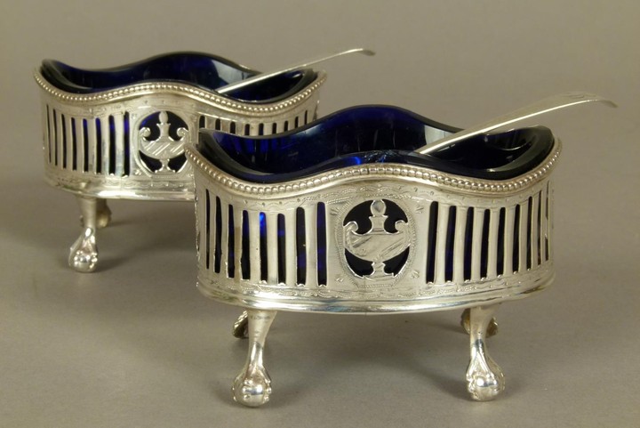 A PAIR OF GEORGE III SILVER OPEN SALTS, oval with wavy rims,...