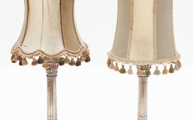 A PAIR OF METAL PLATED CORINTHIAN COLUMN LAMP BASES WITH SIMILAR TASSELLED VELUM SHADES (SHADES AF), TOTAL HEIGHT 74CM