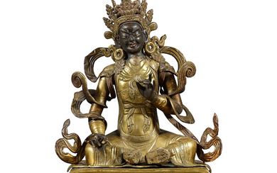 A REPOUSSE GILT-BRONZE FIGURE OF A CELESTIAL GUARDIAN INNER MONGOLIA, STYLE OF DOLONNOR MONASTERY, CIRCA 1800