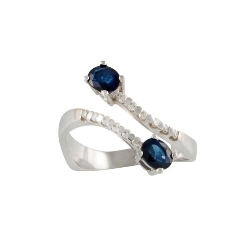 A SAPPHIRE AND DIAMOND RING, of cross over design, mounted ...