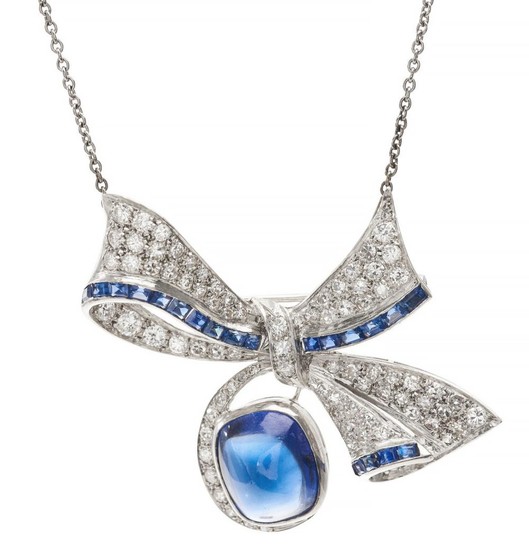 A SYNTHETIC SAPPHIRE AND DIAMOND PENDANT/BROOCH