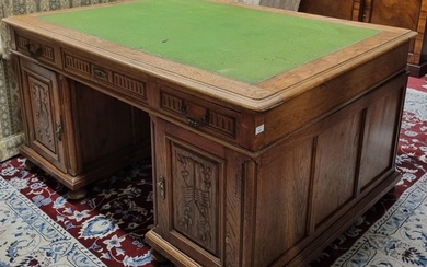 A Superb 19th Century Oak Pedestal Desk with highly carved d...