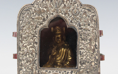A Tibetan white metal mounted copper gau (portable shrine), late 19th century, the copper box of arc