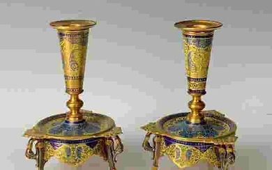 A VERY FINE PAIR OF CHAMPLEVE ENAMEL CANDEL HOLDERS