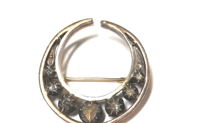A Victorian diamond set crescent brooch