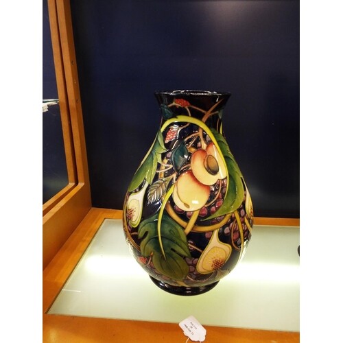A William Moorcroft large bulbous 'Queens choice' vase 'Pome...