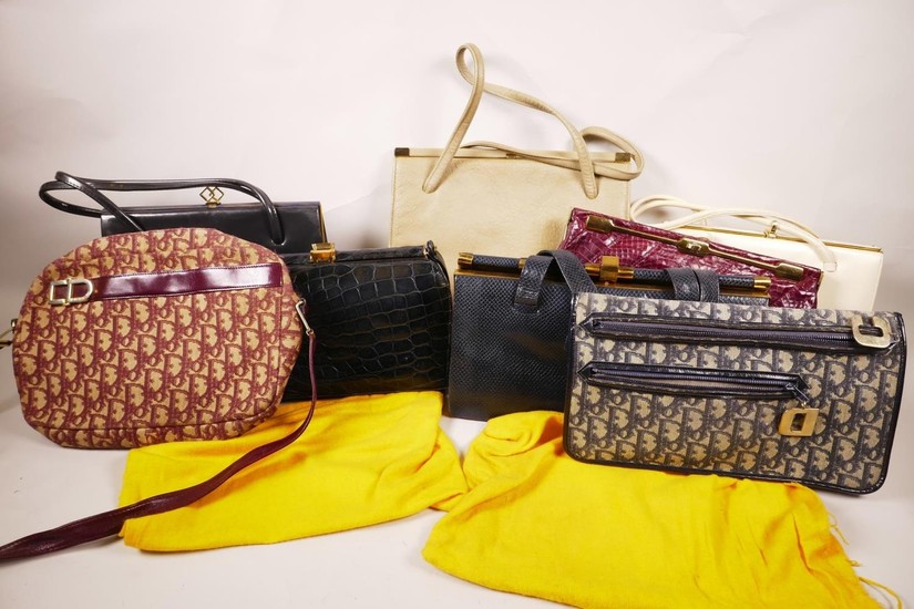 A box of circa twenty vintage designer handbags and purses f...