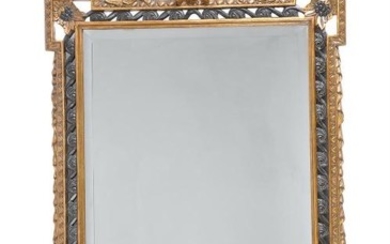A carved gilt and ebonised framed wall mirror in George II style