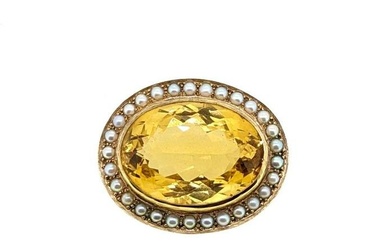 A citrine and pearl target style brooch, rubover set oval faceted citrine, approximately 30 x 22mm