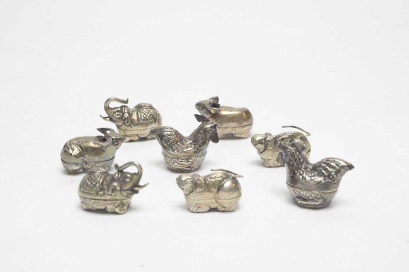 A collection of eight Chinese novelty white-metal pill boxes
