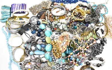 A collection of modern and vintage costume jewellery to include...