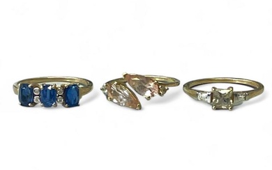 A collection of three 9ct gold gem set rings by...