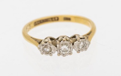 A diamond and 18ct gold three stone ring, size L,...