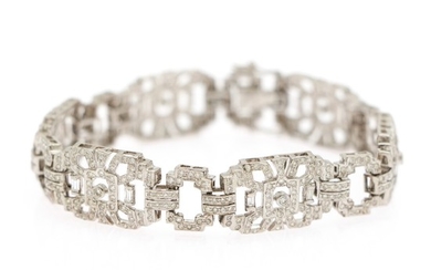 A diamond bracelet set with numerous baguette- and brilliant-cut diamonds, totalling app. 4.65 ct., mounted in 14k white gold. L. 19.5 cm.