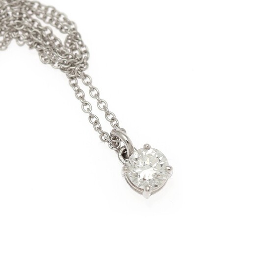 A diamond pendant set with a brilliant-cut diamond, mounted in 18k white gold. Accompanied by chain of 18k white gold. (2)