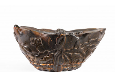 A finely carved hoof, naturalistic motifs and cranes, apocryphal Qianlong mark (defects) China, 20th century (13.5x6x9.6 cm.) This lot...
