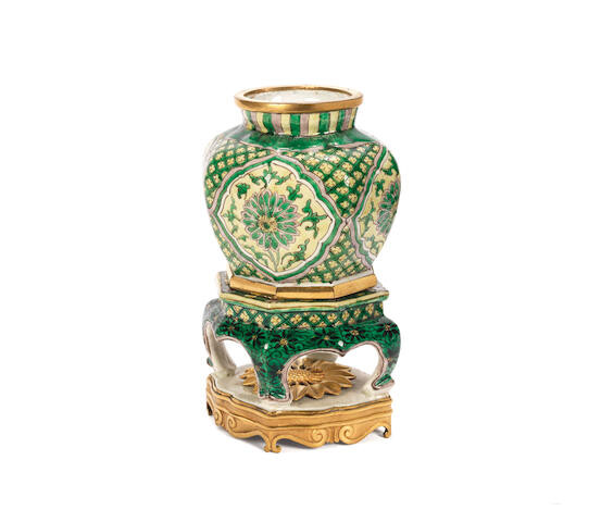 A gilt bronze mounted Chinese pale yellow ground famille verte porcelain incense burner on stand