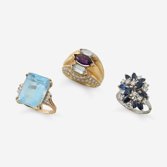 A group of three diamond or gem-set gold rings