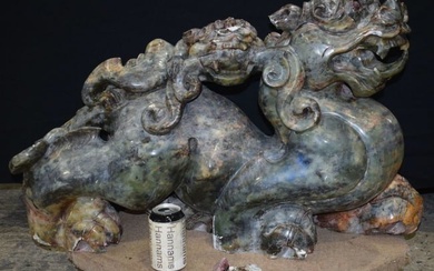 A huge Chinese carved hardstone Foo Dog 82 x 50 cm