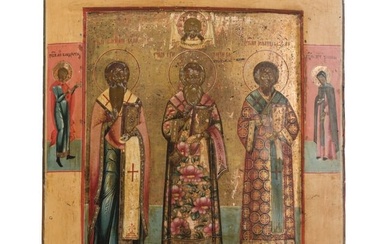 A large Russian icon showing the three Hierarchs Basil the Great, Gregory the Theologian and John