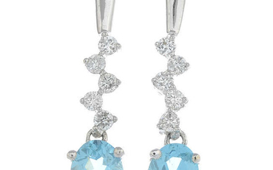 A pair of 18ct gold diamond and apatite earrings.