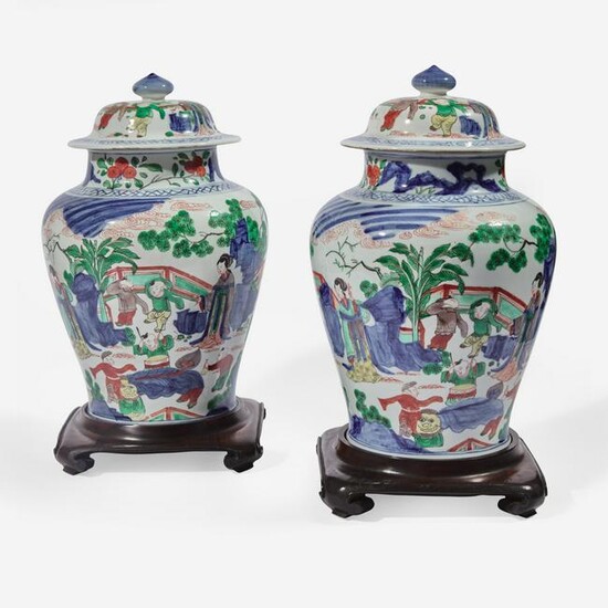 A pair of Chinese wucai decorated porcelain jars with