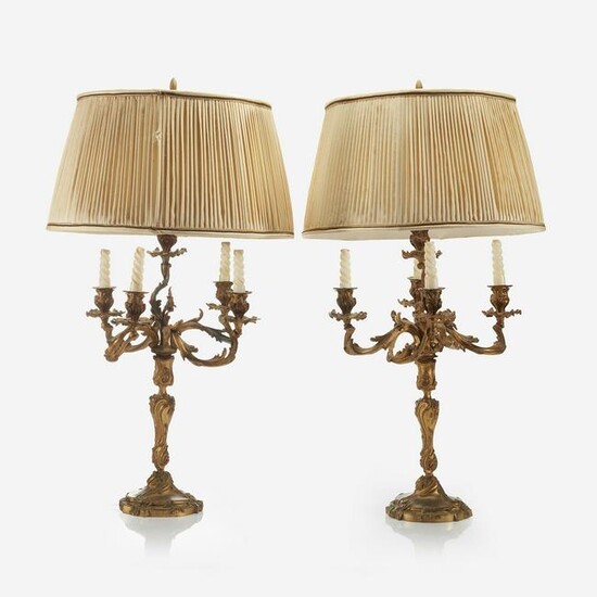 A pair of Louis XV style gilt-bronze candelabra, Late