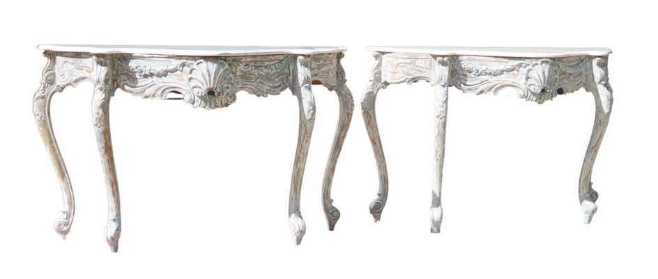 A pair of Louis XV style marble-topped carved and...