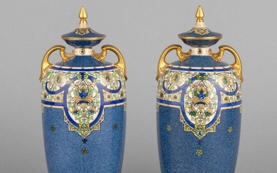 A pair of Royal Worcester vases and covers, 11 in. (27.9 cm.) h.